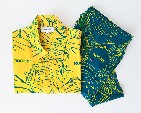Yellow and green patterned shirt and shorts with 'ROODY' branding on a white background