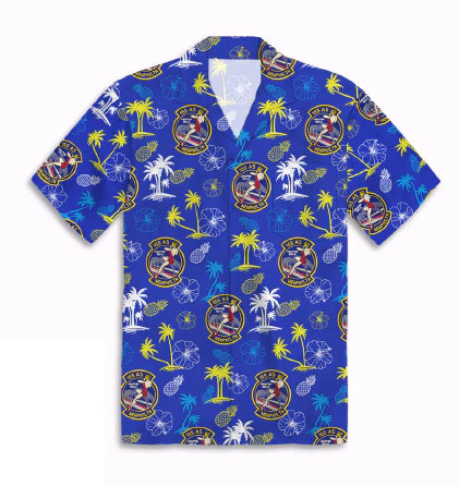 Blue Hawaiian shirt with palm tree and beach ball pattern on a white background