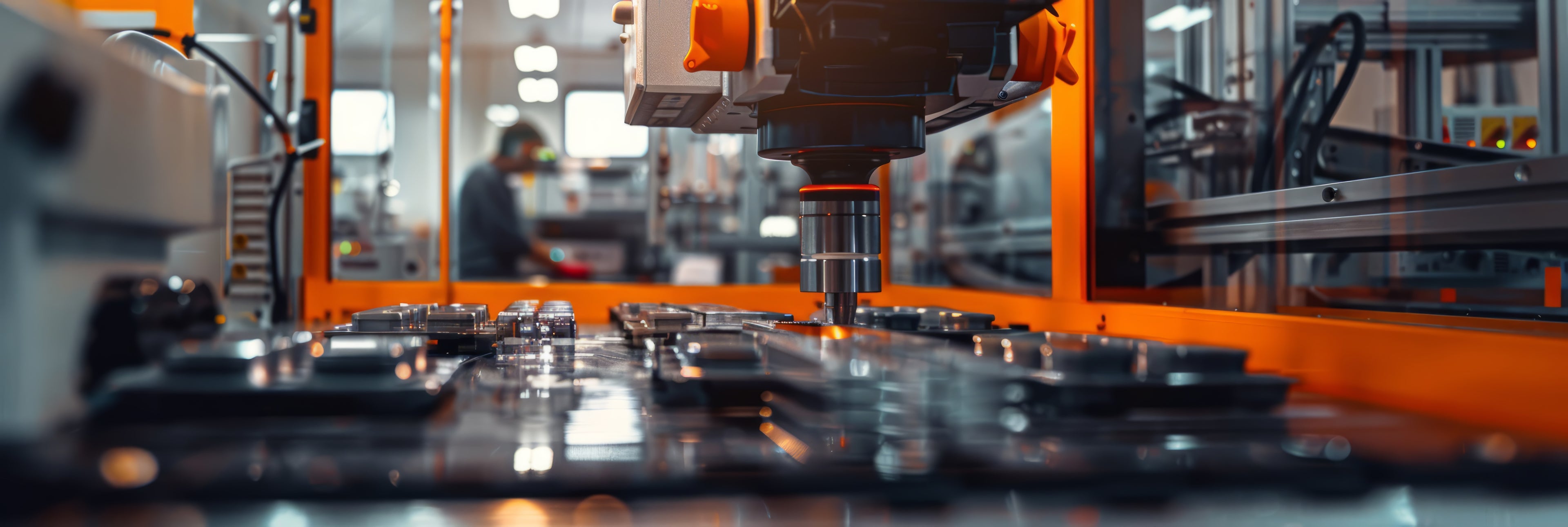 Automated manufacturing process with robotic arms and conveyor belts in a factory setting.