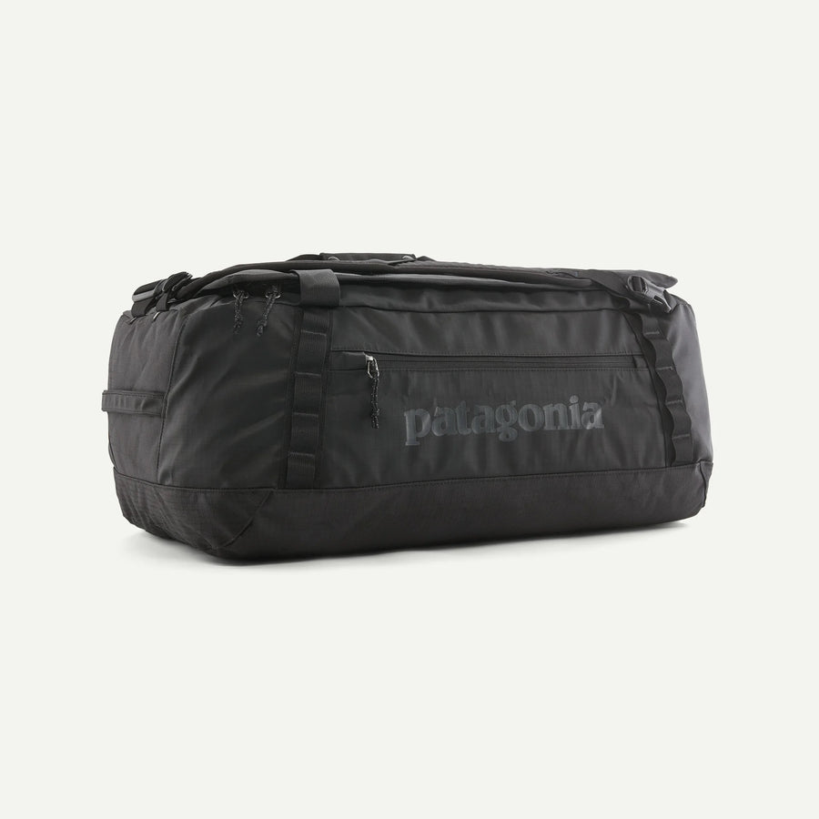 Black duffel bag with Patagonia logo on a white background
