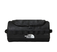 Black toiletry bag with The North Face logo on a white background