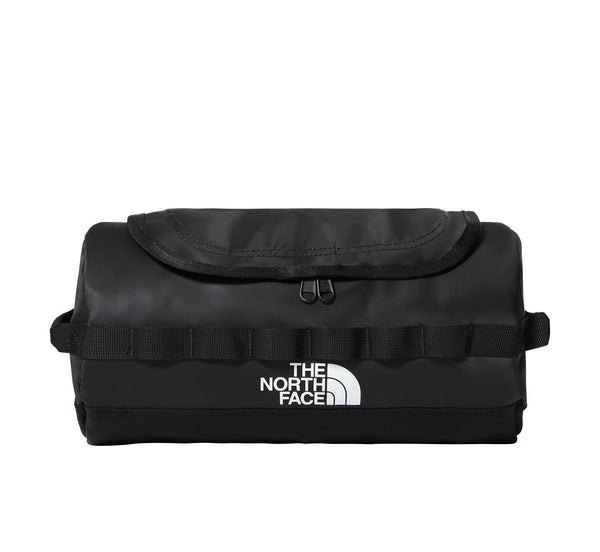 Black toiletry bag with The North Face logo on a white background