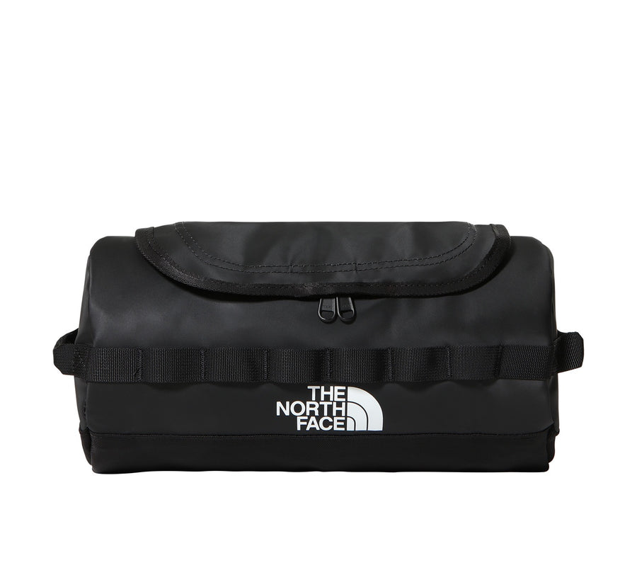 Black toiletry bag with The North Face logo on a white background