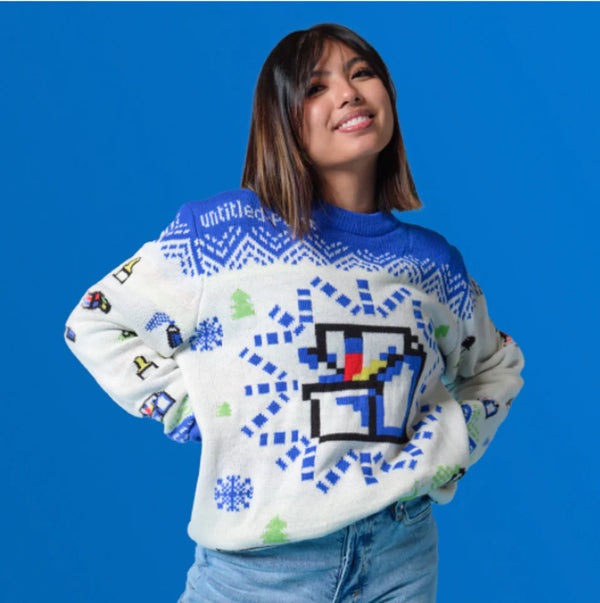 Model wearing custom branded Christmas jumper with pixel art design – Roody custom knit sweaters Ireland