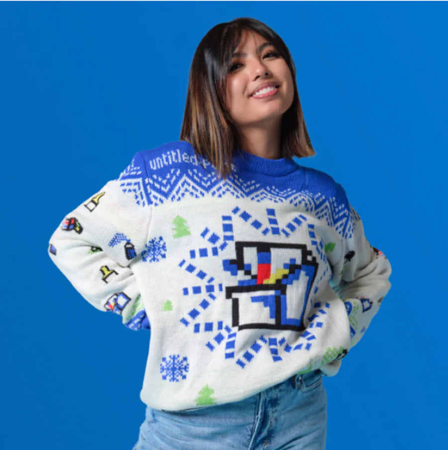 Model wearing custom branded Christmas jumper with pixel art design – Roody custom knit sweaters Ireland