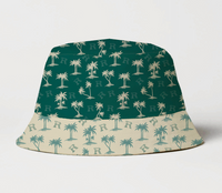 Bucket hat with palm tree pattern on green and beige background