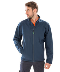 Back view of custom branded navy softshell jacket – Roody promotional workwear Ireland