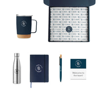 Welcome swag box assembled with branded onboarding gifts